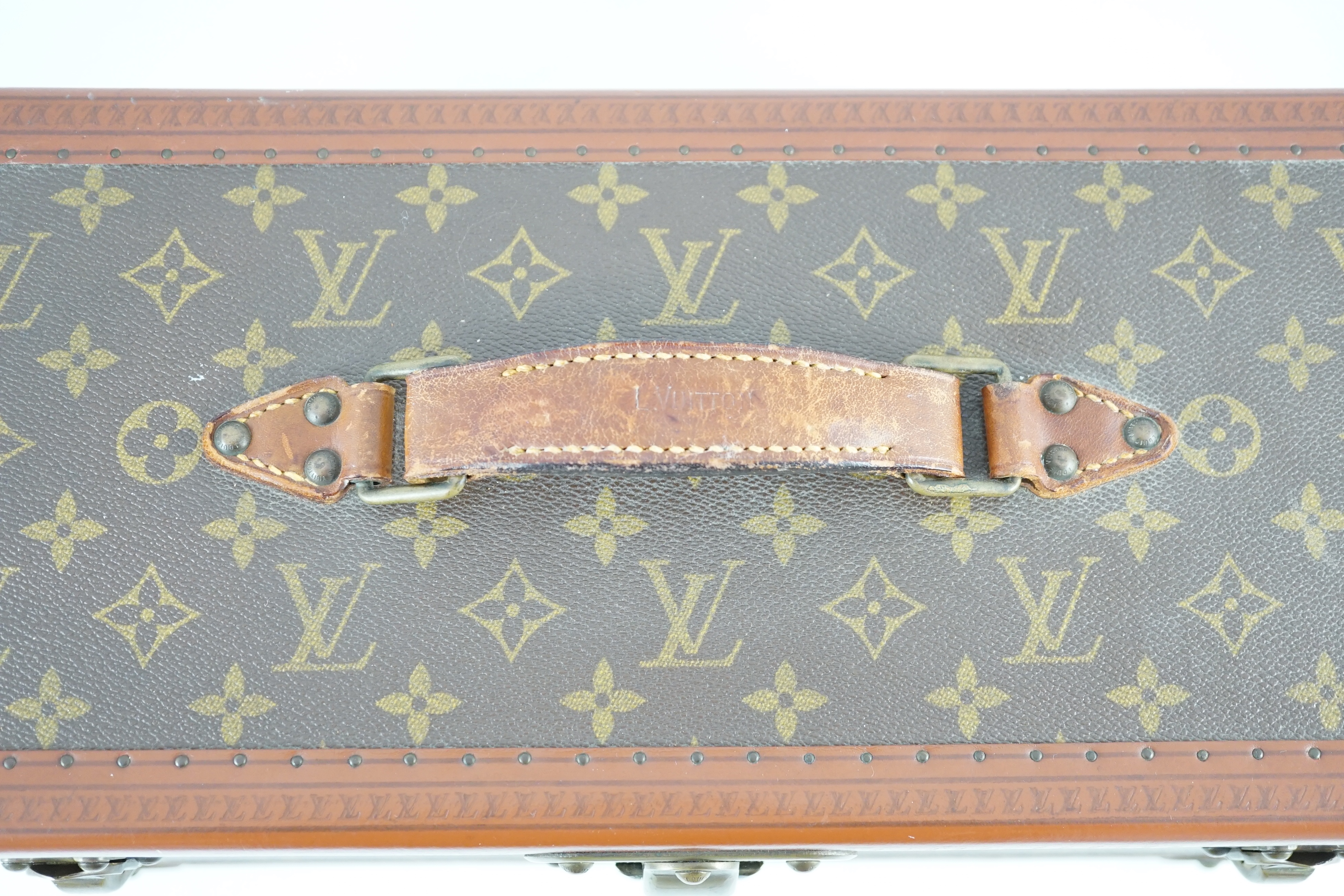 A Louis Vuitton train case, no.873750 Width 41cm. Depth 18cm. Height 24cm.